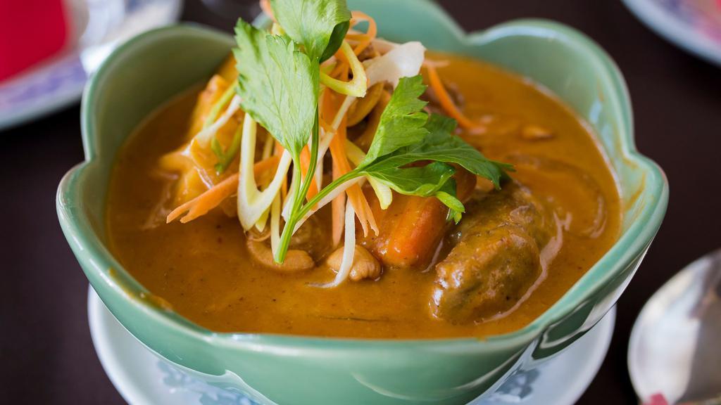 Massaman Curry (Mild Curry)
 · Mild curry combined with coconut milk, chunky potato, onion, peanuts,
and carrots.