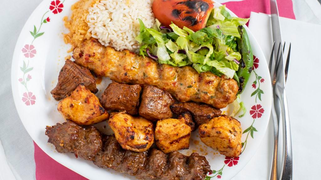 Kebabci Mix For 2 People · 5 different meats one stick of each  Adana kebab,   Gyro kebab ,  Chicken Adana kebab , 
Chicken Shish kebab   , Lamb shish kebab, 
Served with Rice,Bulgur (cracked wheat ) and green salad, hot sauce and white sauce (tzatziki)