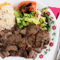 8- Gyro Kebab · Lamb and beef cooked on a bed of spicy sauce