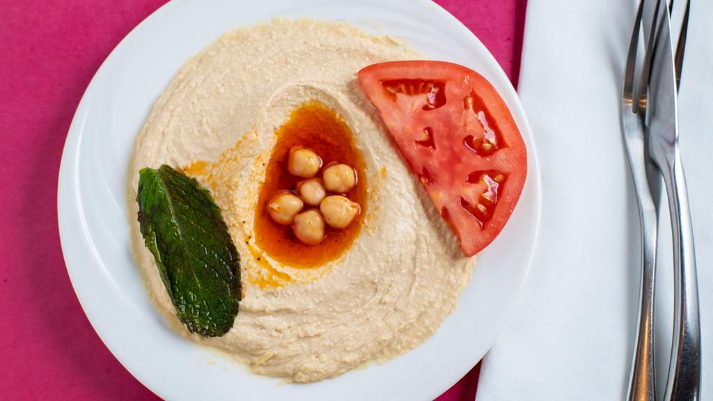 Hummus · Pureed chickpeas with sesame oil and a hint of garlic.