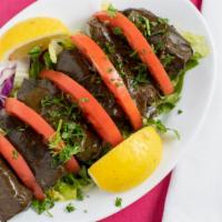9- Grape Leaves · Grape leaves stuffed with rice, herbs, spices, parsley and onion