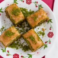 Baklava · Very thin layers of dough with walnuts and syrup.