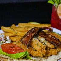 Crispy Chicken Blt · Crispy cooked chicken breast, bacon, lettuce, tomatoes, served with our homemade seasoned ch...