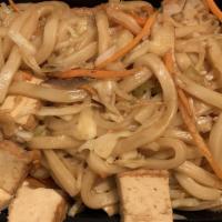 Stir-Fried Udon Noodles · With vegetables and brown tofu.