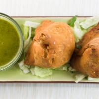 #1. Samosa (Punjabi) (2 Pcs) · Crispy turnovers filled with spiced potatoes & peas.