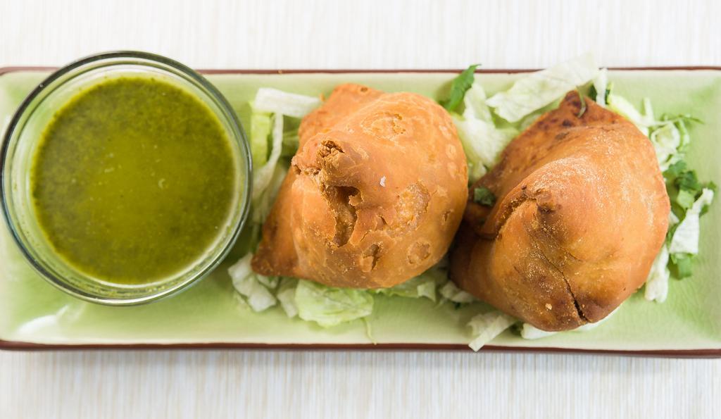 #1. Samosa (Punjabi) (2 Pcs) · Crispy turnovers filled with spiced potatoes & peas.