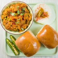 #23. Pav Bhaji · Mixed vegetables prepared in a spicy curry of tomatoes, onion & garlic served with bread.