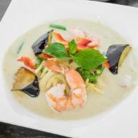 Green Curry. · Green curry, coconut milk, bamboo shoot, green bean and basil.