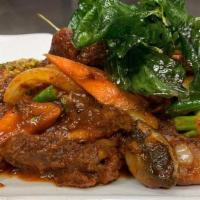 Spicy Ginger. · Stir fried marinated spicy beef with fresh. ginger chili and seasoned vegetables