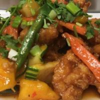 Chicken Mango. · Lightly breaded chicken with fresh mango, seasonal vegetables sweet and sour sauce