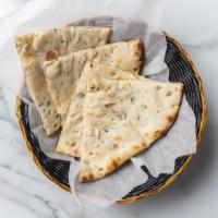 Paneer Kulcha · Flatbread stuffed with cottage cheese and seasoned with Indian spices