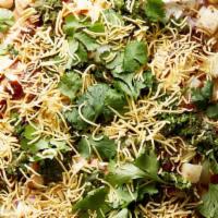 Aloo Papdi Chaat · Crisp fried dough wafers known as papdi along with boiled chick peas, boiled potatoes, yogur...