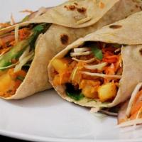 Vegetable Kathi Roll (2) · Kathi rolls are filled with cabbage, potatoes, carrots, onions and spices rolled in paratha....