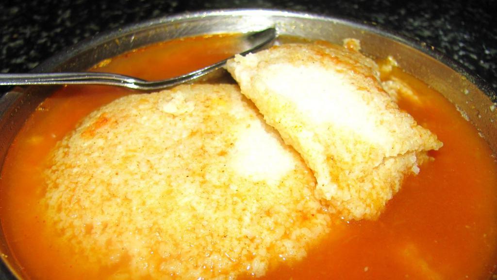 Idli Or Medu Vada In Sambar Or Rasam Bowl · Rasam is a soup traditionally prepared using tamrind juice as a base with addition of tomato, chili pepper, cumin & other seasonings. (Gluten Free, Vegan).