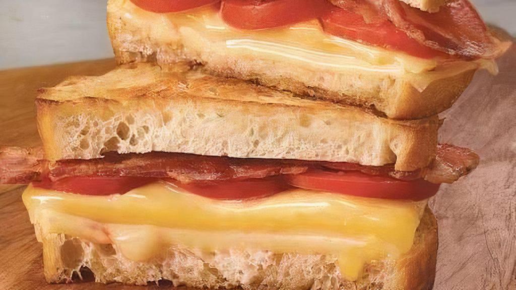 Grilled Cheese, Bacon & Tomato · Bacon, cheese (choice) & tomato on choice of bread