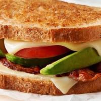 Bacon, Avocado, Tomato & Swiss Grilled Cheese · Swiss cheese, avocado (or spread), tomato and bacon on choice of bread