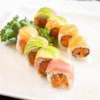Pink Lady Roll · Crunchy, spicy tuna with sliced tuna, salmon and avocado on top.

This menu item consists of...