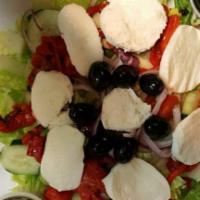 Mediterranean Salad · Small. Mixed greens, tomatoes, onions, roasted peppers and fresh mozzarella cheese.