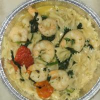 Pasta With Shrimp · With diced tomatoes, garlic and olives in an olive sauce.