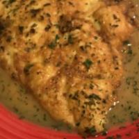 Chicken Francese · Dipped in egg batter and sautéed, served in white wine, lemon and butter sauce.