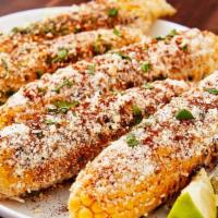 Btc Elote · Corn on the cob, dressed with chipotle mayo, Cotija cheese and chile piquin powder.