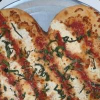 Heart Shaped Grandma Pizza · Our signature Grandma pie as a heart, for the ones you love, or yourself. Perfect for Valent...
