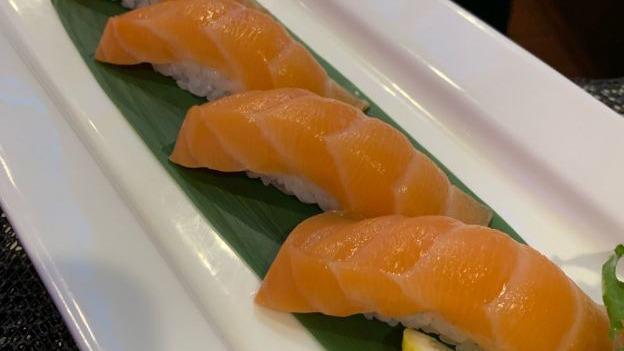 Salmon · Sushi is slices of fish on sushi rice (2 pcs) per order and sashimi is slices of fish (3 pcs) per order.