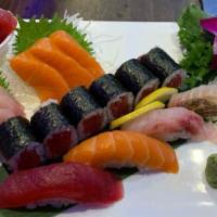 Sushi & Sashimi Combo · Chefs choices five pieces of sushi, nine pieces of sashimi and a tuna roll.