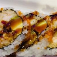 Shrimp Tempura Roll · Shrimp tempura, avocado, and masago topped with kabayaki sauce.