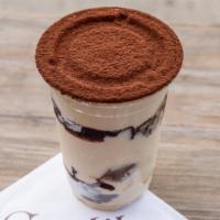 Tiramisu · Mascarpone cream layered with lady fingers soaked w/ espresso and chocolate