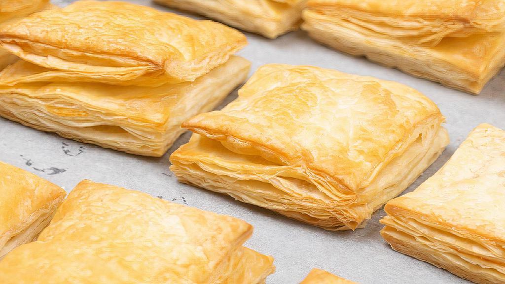 Haitian Beef Patty (Pate) · Spicy. Spicy, flavorful, delectable beef stuffed in puff pastry dough.
