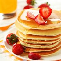 Strawberry Pancake · Delicious fluffy and airy pancaked topped with fresh strawberries.