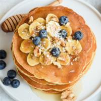 Banana Blueberry Pancake · Delicious fluffy and airy pancaked topped with fresh bananas and blueberries.