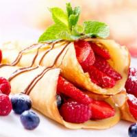 Mixed Berries Nutella Crepe · Fresh thin crepe with strawberries, blackberries, blueberries, and raspberries topped with n...