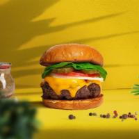 Cheese Biz Vegan Burger · Seasoned plant-based patty topped with melted vegan cheese, lettuce, tomato, onion, and pick...