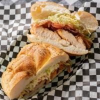 Chicken Sandwich (Club) · Crispy or grilled served on a roll. BLT, herb mayo.