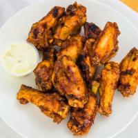 The Irondequoit Wing · A dozen wings, flash-fried and char-grilled to perfection; tossed in our signature Irondequo...