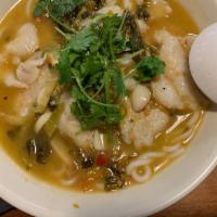 金汤酸菜鱼米粉Golden Fish Fillets Rice Noodle Soup · Golden fish fillets rice noodle soup