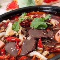 毛血旺 Big Chungking · Hot. Pork blood tofu, pork luncheon meat, Beef tripe and cabbage in spicy broth.