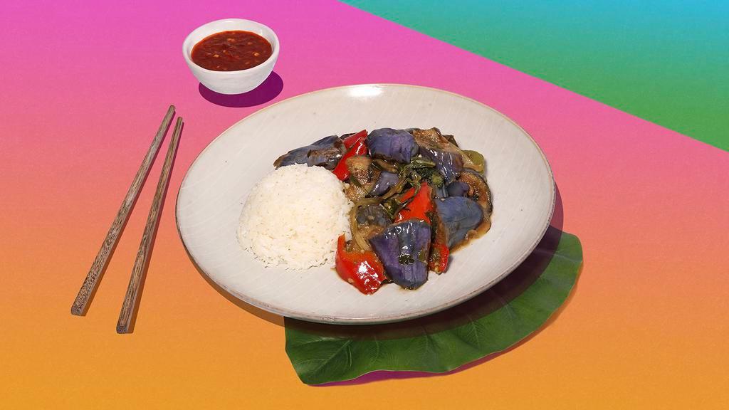 Vegan Eggplant Stir Fry · Stir-fried eggplant, chiles, basil, garlic, onions, and bell peppers and your choice of tofu or vegetables.