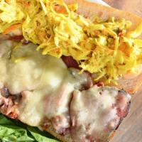 Pastrami Sandwich · Grilled pastrami, melted Swiss cheese, coleslaw, and Russian dressing on grilled foccacia br...