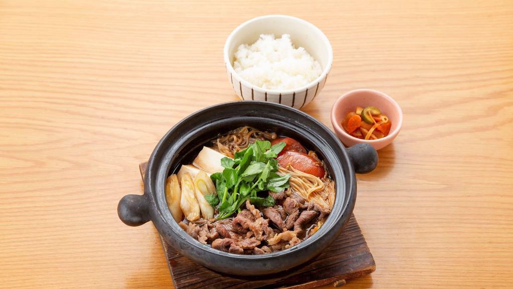 Beef Sukiyaki Nabe (Dinner) · Japanese traditional dish which contains thinly sliced beef and vegetables. Served with white rice and homemade pickles.