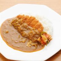 Tonkatsu Curry (Dinner) · Japanese style curry topped with a breaded deep-fried pork cutlet. It comes with soup.
