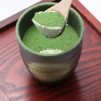 Genmai Matcha Pudding · An original Genmai Matcha tea infused pudding with red beans on the bottom
