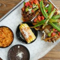 Mariachi Trio Tacos · Three delicious tacos served in corn tortillas stuffed with your choice of steak or chicken,...