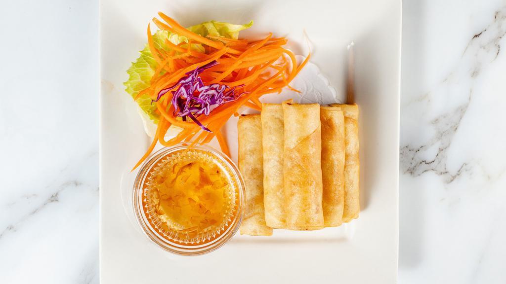 Crispy Spring Roll · Spring roll stuffed with vermicelli, carrots, and cabbage. Served with plum sauce.