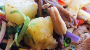 Duck Salad · Crispy duck with tomatoes, red onion, pineapple, cashew nuts, green apple mixed spicy lime d...