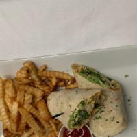 Chicken Wrap · Grilled or fried chicken breast, romaine lettuce, tomato & your choice of Caesar dressing, b...