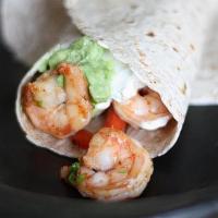 Shrimp Fajita Burrito · Flour or Whole Wheat tortilla filled with Shrimp with onions, peppers and garlic, your choic...