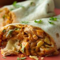 Breaded Chicken Burrito · Flour or Whole Wheat tortilla filled with breaded chicken, rice, beans, cheese sour cream an...
